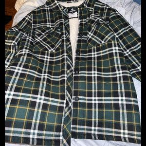 Dark green, plaid coat with fuzzy inside.